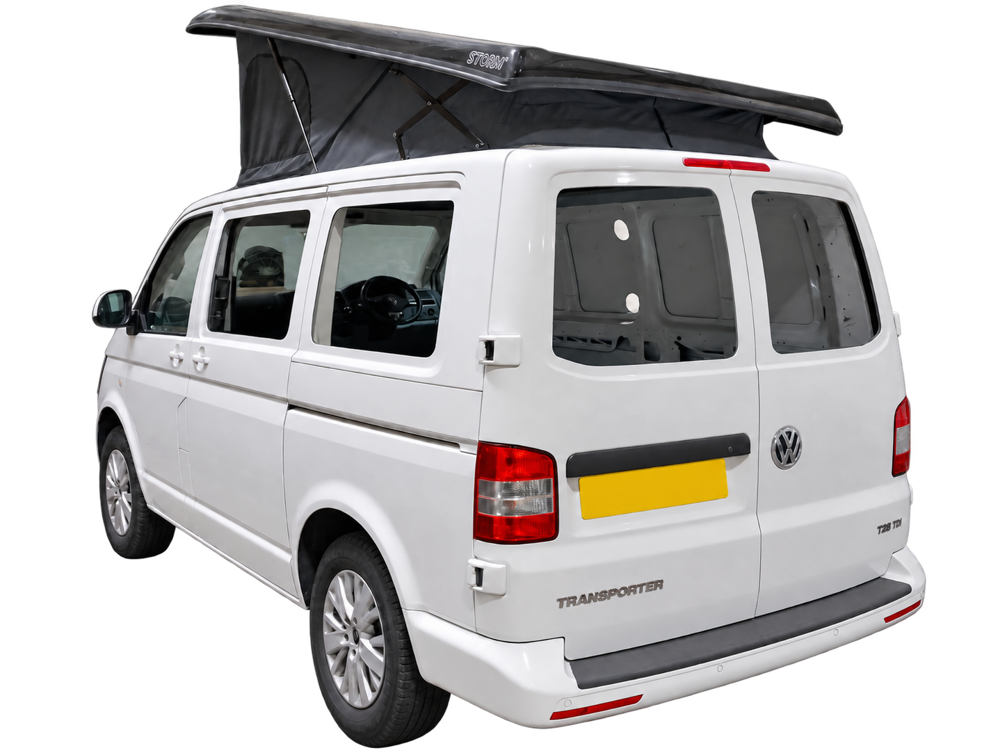 VW Transporter with the side and rear quarter apertures cut ready for glazing